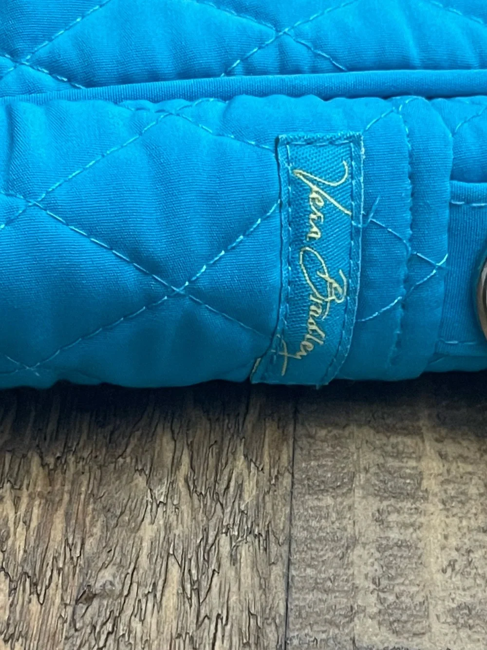 a Vera Bradley Microfiber Turquoise Large Laptop Bag.